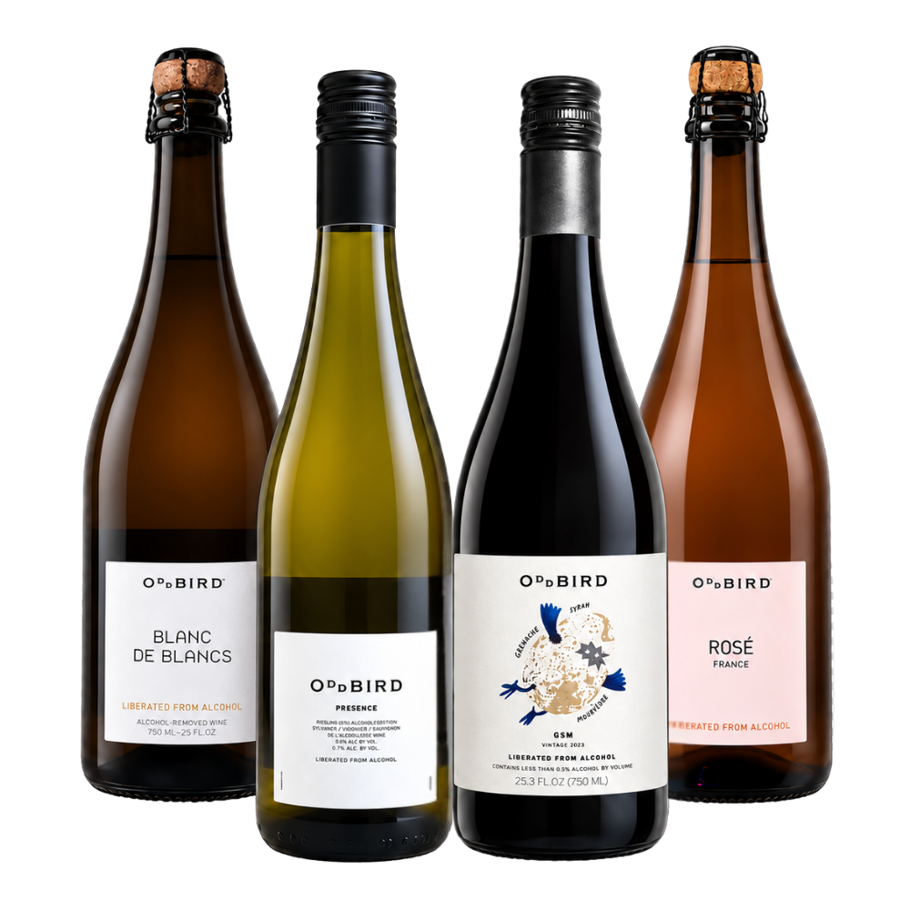 Four O'o Bird wine bottles arranged side by side on a white background, including Blanc de Blancs, Presence, Cuvée, and Rosé Française.