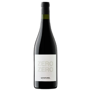 A bottle of Le Naturel Zero wine with a dark glass body, a white label with embossed lettering, and a black capsule, shown against a plain white background.