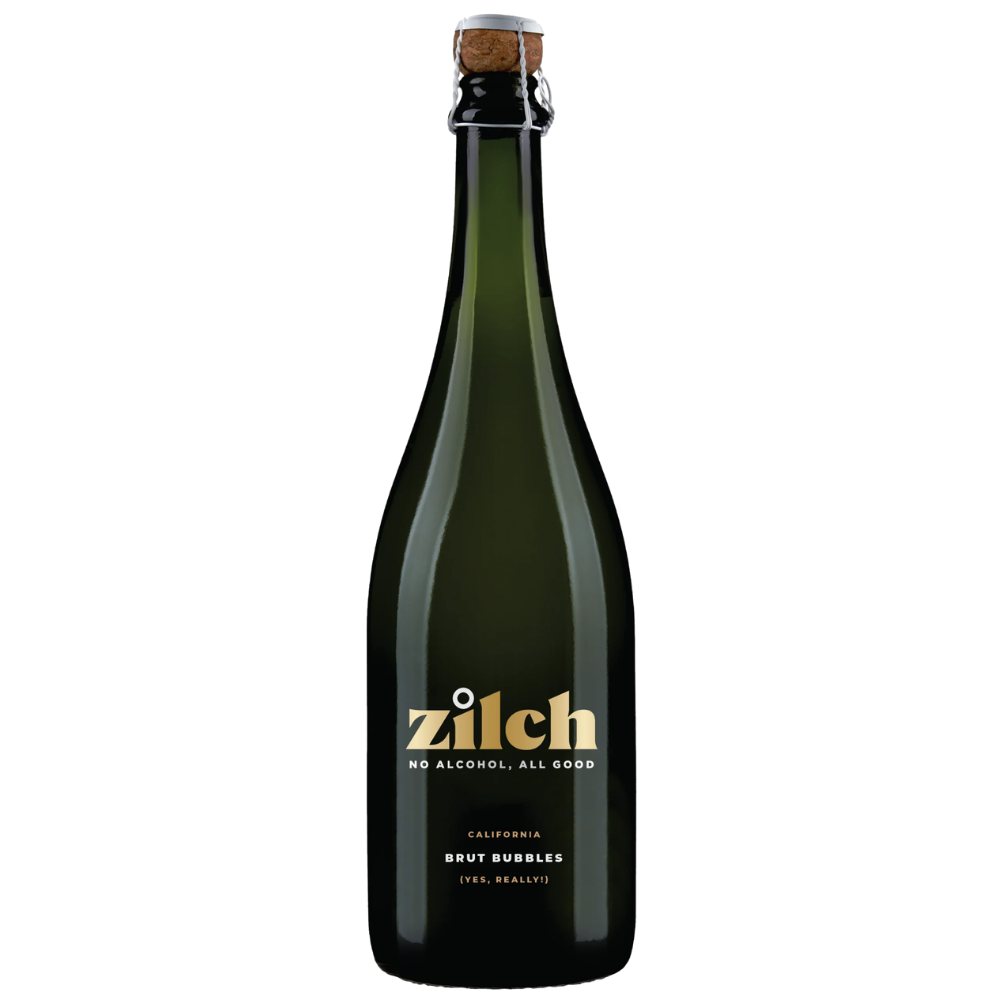 A dark green glass bottle of Zilch Brut Bubbles non-alcoholic sparkling wine, sealed with a cork and featuring a gold logo on a white background.