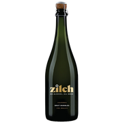 A dark green glass bottle of Zilch Brut Bubbles non-alcoholic sparkling wine, sealed with a cork and featuring a gold logo on a white background.