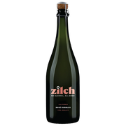 A bottle of Zilch California Rose Bubbles Free Alcohol sparkling wine, featuring a dark green glass bottle with a cork stopper and a pink and white label.